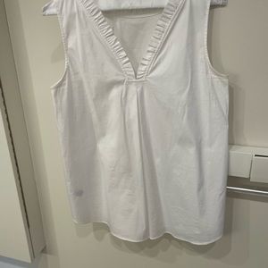 Lafayette New York 148 reversible cotton ruffle neck, V-back top.